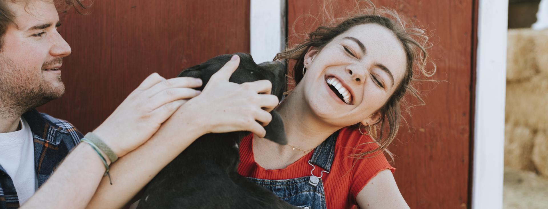 Man and a woman with a found dog 